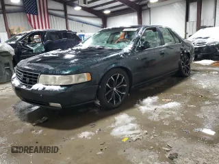 2000 Cadillac Seville Touring STS z VIN 1G6KY5494YU220613, wystawiony jako Copart lot #87338724 z przebiegiem 106 313 mil mil oraz Szkody całkowita. Historia ofert i sprzedaży dostępna na DreamBid. Obrazek 1.