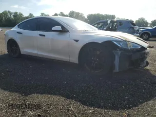 2013 Tesla Model S с VIN 5YJSA1CG2DFP25370, выставлен на аукционе Copart как лот 64003825 с пробегом 85 656 миль миль и Списание • Salvage title. История ставок и продаж доступна на DreamBid. Изображение 4.
