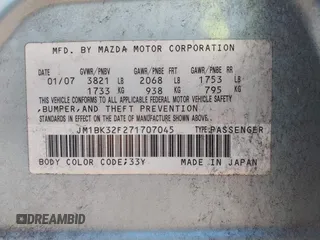 2007 Mazda 3 i Sport with VIN JM1BK32F271707045, listed as a IAAI auction lot 42166852 with 101,693 mi miles. Bid and sale history available at carsss.com. Image 9.