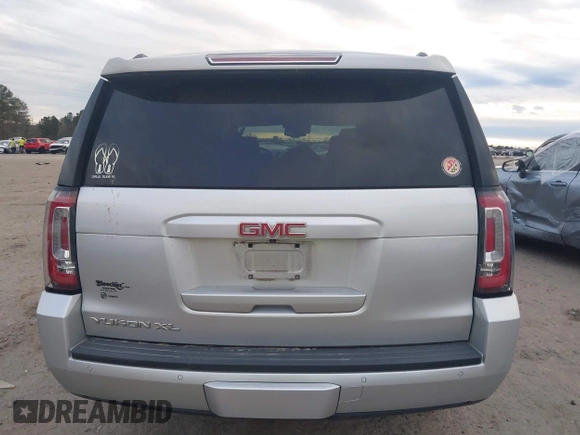 2019 GMC Yukon XL SLT with VIN 1GKS1GKC8KR383694, listed as a IAAI auction lot 41466213 with 128,368 mi miles. Bid and sale history available at carsss.com. Image 16.