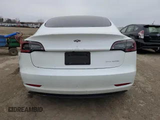 2022 Tesla Model 3 Long Range with VIN 5YJ3E1EB3NF353131, listed as a Copart auction lot 52582025 with 68,745 mi miles and Salvage Title. Bid and sale history available at carsss.com. Image 6.