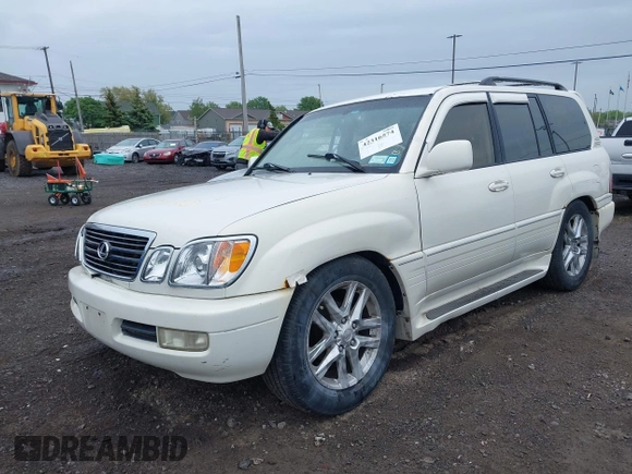 2000 Lexus LX 470 z VIN JT6HT00W8Y0096929, wystawiony jako IAAI lot #42316574 z przebiegiem 227 839 mil mil oraz . Historia ofert i sprzedaży dostępna na DreamBid. Obrazek 2.