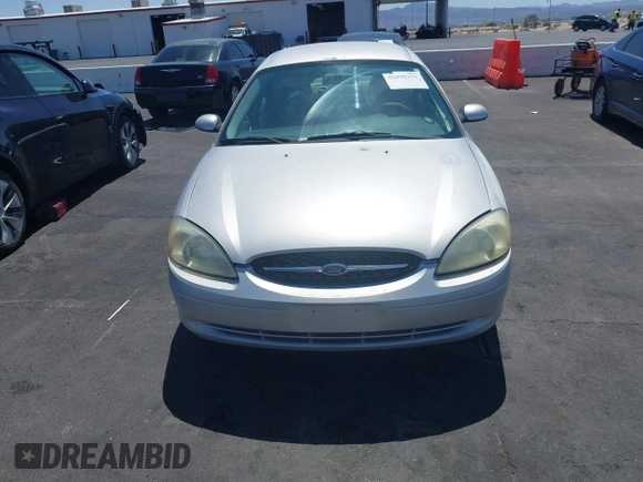 2003 Ford Taurus SE Standard with VIN 1FAFP53UX3G268265, listed as a IAAI auction lot 42090151 with 139,734 mi miles. Bid and sale history available at carsss.com. Image 6.