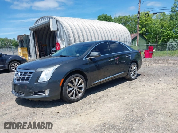 2013 Cadillac XTS Luxury z VIN 2G61R5S33D9101434, wystawiony jako IAAI lot #42290199 z przebiegiem 48 075 mil mil oraz . Historia ofert i sprzedaży dostępna na DreamBid. Obrazek 18.