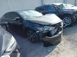 2016 Nissan Maxima SL with VIN 1N4AA6AP5GC448751, listed as a IAAI auction lot 41935029 with 105,101 mi miles and . Bid and sale history available at DreamBid. Image 1.