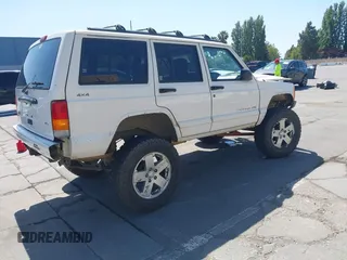 1998 Jeep Cherokee Sport with VIN 1J4FJ68S4WL227094, listed as a IAAI auction lot 42361950 with Not provided miles and . Bid and sale history available at DreamBid. Image 4.