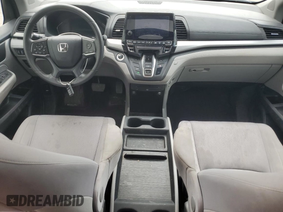 2018 Honda Odyssey with VIN 5FNRL6H49JB504977, listed as a Copart auction lot 60905615 with 180,464 mi miles and Clean title. Bid and sale history available at DreamBid. Image 8.