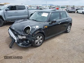 2015 MINI Hardtop 4 Door z VIN WMWXS5C58FT831568, wystawiony jako IAAI lot #42129819 z przebiegiem 76 044 mil mil oraz . Historia ofert i sprzedaży dostępna na DreamBid. Obrazek 18.