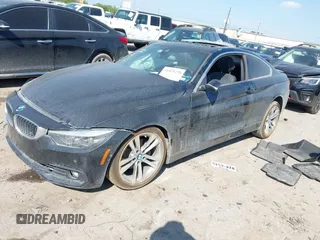 2019 BMW 4 Series 430i with VIN WBA4W3C51KAG91397, listed as a IAAI auction lot 41871270 with 108,701 mi miles and . Bid and sale history available at carsss.com. Image 2.