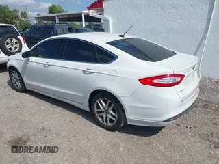 2013 Ford Fusion SE with VIN 3FA6P0HR9DR185038, listed as a IAAI auction lot 42104424 with 174,354 mi miles. Bid and sale history available at carsss.com. Image 3.
