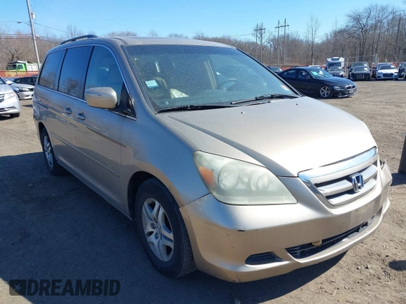 2006 Honda Odyssey EX-L z VIN 5FNRL38736B069969, wystawiony jako IAAI lot #41695311 z przebiegiem 196 218 mil mil oraz . Historia ofert i sprzedaży dostępna na DreamBid. Obrazek 18.