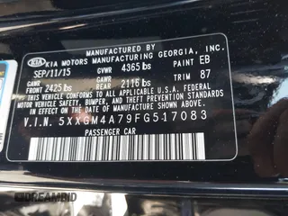2015 Kia Optima LX with VIN 5XXGM4A79FG517083, listed as a IAAI auction lot 41805370 with 77,800 mi miles. Bid and sale history available at carsss.com. Image 9.