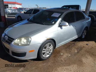 2007 Volkswagen Jetta Sedan 2.5L with VIN 3VWSG71K27M033082, listed as a IAAI auction lot 41819794 with 239,939 mi miles. Bid and sale history available at carsss.com. Image 2.