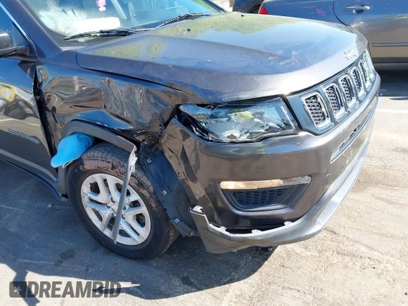 2019 Jeep Compass Sport with VIN 3C4NJCAB2KT613117, listed as a IAAI auction lot 41999519 with 73,734 mi miles and . Bid and sale history available at DreamBid. Image 6.