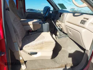 1999 Ford Super Duty F-250 XL with VIN 1FTNW21F7XEA71082, listed as a IAAI auction lot 41665200 with 210,841 mi miles. Bid and sale history available at carsss.com. Image 5.