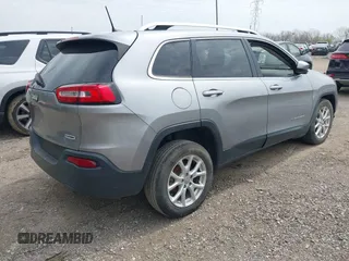 2016 Jeep Cherokee 75th Anniversary with VIN 1C4PJLCB5GW274005, listed as a IAAI auction lot 42037084 with 0 mi miles. Bid and sale history available at carsss.com. Image 4.