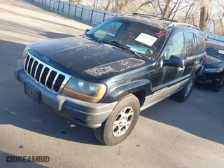 2001 Jeep Grand Cherokee Laredo with VIN 1J4GW48S51C517217, listed as a IAAI auction lot 41773968 with 189,350 mi miles. Bid and sale history available at carsss.com. Image 2.
