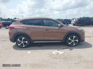 2017 Hyundai Tucson Value with VIN KM8J33A27HU430198, listed as a IAAI auction lot 42104369 with 163,929 mi miles. Bid and sale history available at carsss.com. Image 13.