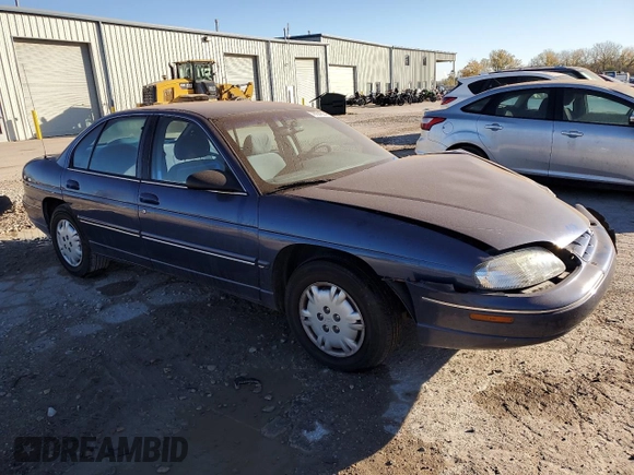 1997 Chevrolet Lumina LS with VIN 2G1WL52M0V1100215, listed as a Copart auction lot 78924694 with 200,402 mi miles and Salvage Title. Bid and sale history available at DreamBid. Image 4.