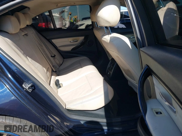 2015 BMW 3 Series 328i with VIN WBA3C1C50FK124300, listed as a IAAI auction lot 40112372 with 142,591 mi miles and . Bid and sale history available at carsss.com. Image 8.