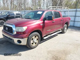 2007 Toyota Tundra SR5 with VIN 5TBDV54117S487602, listed as a IAAI auction lot 42106287 with 214,725 mi miles. Bid and sale history available at carsss.com. Image 2.