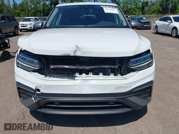 2024 Volkswagen Tiguan with VIN 3VVTB7AX9RM217926, listed as a IAAI auction lot 42339057 with 8,233 mi miles and . Bid and sale history available at DreamBid. Image 6.