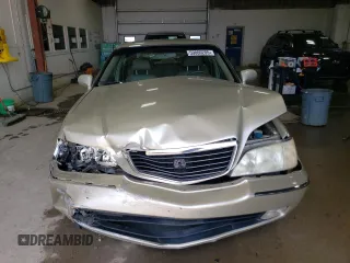 2004 Acura RL w/Navigation System z VIN JH4KA96644C004769, wystawiony jako Copart lot #59800205 z przebiegiem 172 279 mil mil oraz Szkoda całkowita • Salvage title. Historia ofert i sprzedaży dostępna na DreamBid. Obrazek 5.