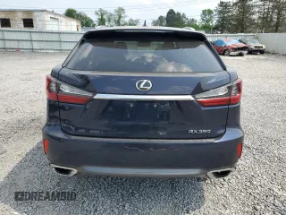 2018 Lexus RX 350 with VIN 2T2BZMCA6JC149235, listed as a Copart auction lot 59939505 with 214,676 mi miles and Salvage title. Bid and sale history available at DreamBid. Image 6.