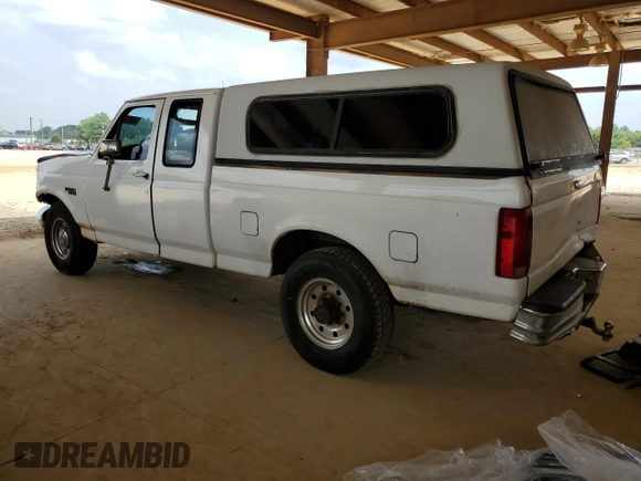 1997 Ford F-250 with VIN 1FTHX25F2VEC79419, listed as a Copart auction lot 53997013 with 321,335 mi miles and Salvage title. Bid and sale history available at DreamBid. Image 2.