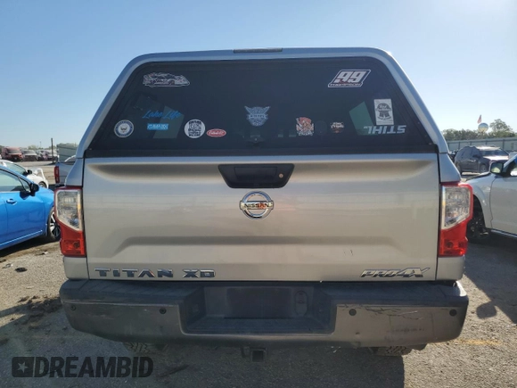 2016 Nissan Titan XD PRO-4X with VIN 1N6BA1F4XGN509643, listed as a Copart auction lot 74530434 with 83,734 mi miles and Clean Title. Bid and sale history available at carsss.com. Image 6.
