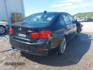 2013 BMW 3 Series 328i with VIN WBA3A5C58DJ462110, listed as a IAAI auction lot 41974562 with 94,211 mi miles. Bid and sale history available at carsss.com. Image 4.