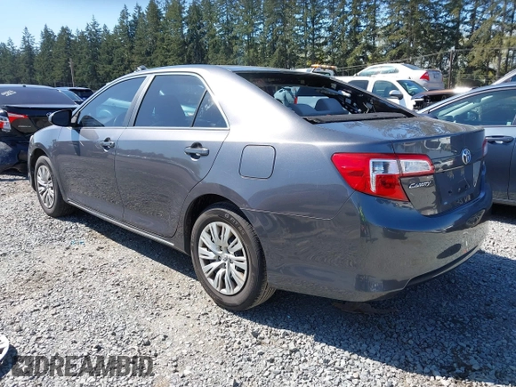 2014 Toyota Camry L with VIN 4T4BF1FK9ER423232, listed as a IAAI auction lot 41980213 with 157,132 mi miles. Bid and sale history available at carsss.com. Image 3.