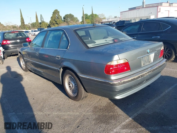 2001 BMW 7 Series 740iL with VIN WBAGH83491DP25818, listed as a IAAI auction lot 41827907 with 125,670 mi miles. Bid and sale history available at carsss.com. Image 3.
