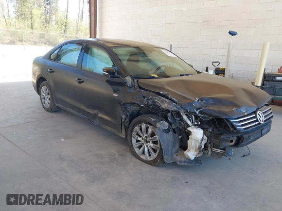 2015 Volkswagen Passat 1.8T Limited Edition with VIN 1VWAT7A36FC054484, listed as a IAAI auction lot 42078125 with 119,550 mi miles. Bid and sale history available at carsss.com. Image 1.
