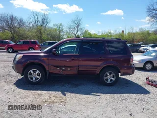 2008 Honda Pilot EX-L with VIN 5FNYF18568B033184, listed as a IAAI auction lot 42054457 with 166,468 mi miles. Bid and sale history available at carsss.com. Image 14.