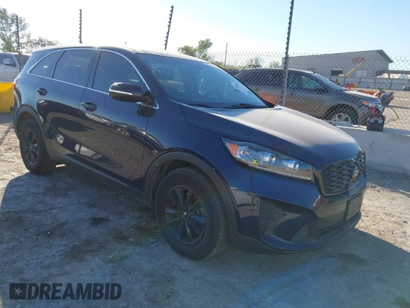 2020 Kia Sorento LX with VIN 5XYPG4A34LG631388, listed as a IAAI auction lot 40513563 with 112,565 mi miles. Bid and sale history available at carsss.com. Image 1.