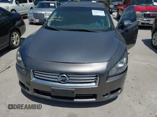 2014 Nissan Maxima SV z VIN 1N4AA5AP1EC440170, wystawiony jako IAAI lot #42837930 z przebiegiem 100 309 mil mil oraz . Historia ofert i sprzedaży dostępna na DreamBid. Obrazek 6.