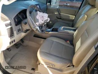 2013 Nissan Titan SV with VIN 1N6AA0EC1DN310572, listed as a Copart auction lot 50017235 with 114,349 mi miles and Salvage title. Bid and sale history available at DreamBid. Image 7.
