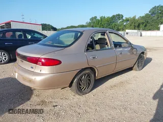1999 Ford Escort SE z VIN 1FAFP13P5XW268897, wystawiony jako IAAI lot #42844258 z przebiegiem 169 050 mil mil oraz . Historia ofert i sprzedaży dostępna na DreamBid. Obrazek 4.