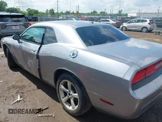 2013 Dodge Challenger SXT с VIN 2C3CDYAG7DH675121, выставлен на аукционе IAAI как лот 42623166 с пробегом 189 604 миль миль и . История ставок и продаж доступна на DreamBid. Изображение 3.