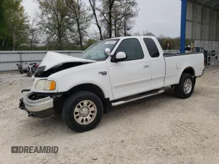 2002 Ford F-150 XL z VIN 1FTRX18L42NB60380, wystawiony jako Copart lot #51806955 z przebiegiem 293 591 mil mil oraz Szkoda całkowita • Salvage title. Historia ofert i sprzedaży dostępna na DreamBid. Obrazek 1.