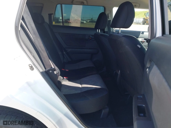 2013 Scion xB with VIN JTLZE4FEXDJ037953, listed as a IAAI auction lot 42002490 with 106,206 mi miles. Bid and sale history available at carsss.com. Image 8.