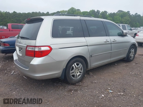 2007 Honda Odyssey EX with VIN 5FNRL384X7B036281, listed as a IAAI auction lot 42058864 with 240,791 mi miles. Bid and sale history available at carsss.com. Image 4.