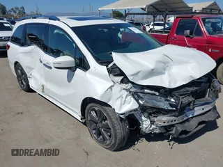 2021 Honda Odyssey Elite z VIN 5FNRL6H96MB016912, wystawiony jako IAAI lot #42714357 z przebiegiem Nie podano mil oraz . Historia ofert i sprzedaży dostępna na DreamBid. Obrazek 1.