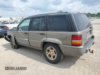 1996 Jeep Grand Cherokee Limited with VIN 1J4GZ78S3TC395758, listed as a Copart auction lot 60326205 with Not provided miles and Salvage title. Bid and sale history available at DreamBid. Image 2.