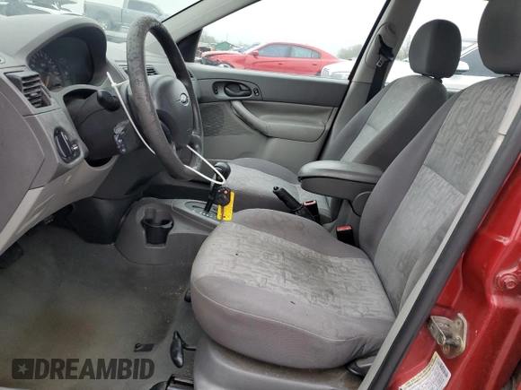 2005 Ford Focus S with VIN 1FAFP34N85W101259, listed as a Copart auction lot 49988555 with 0 mi miles and Salvage Title. Bid and sale history available at carsss.com. Image 7.