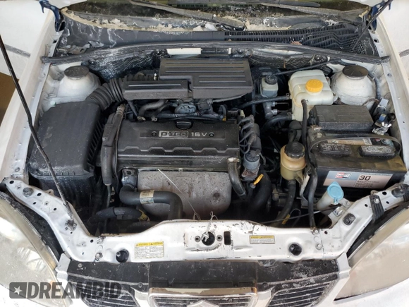 2005 Suzuki Forenza z VIN KL5JJ86Z95K090286, wystawiony jako Copart lot #41743805 z przebiegiem Nie podano mil oraz Szkoda całkowita • Salvage title. Historia ofert i sprzedaży dostępna na DreamBid. Obrazek 11.