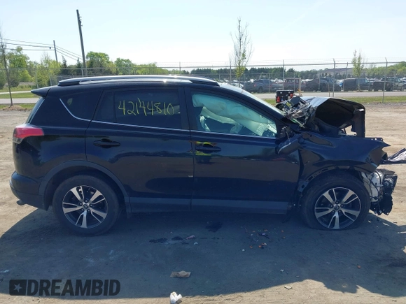 2018 Toyota RAV4 XLE with VIN 2T3WFREVXJW484872, listed as a IAAI auction lot 42144810 with Not provided miles and . Bid and sale history available at DreamBid. Image 14.