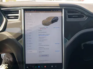2014 Tesla Model S P85D with VIN 5YJSA1H25EFP65571, listed as a IAAI auction lot 42185442 with 115,990 mi miles and . Bid and sale history available at DreamBid. Image 17.