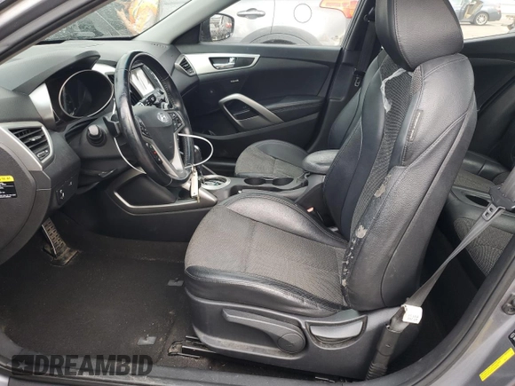 2014 Hyundai Veloster RE:FLEX z VIN KMHTC6AD2EU216453, wystawiony jako Copart lot #87090324 z przebiegiem 147 771 mil mil oraz Czysty tytuł • Clean title. Historia ofert i sprzedaży dostępna na DreamBid. Obrazek 7.